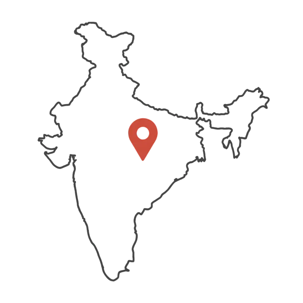 "Outline map of India with a red location pin at the center, displayed on a dark background in minimalist style."
