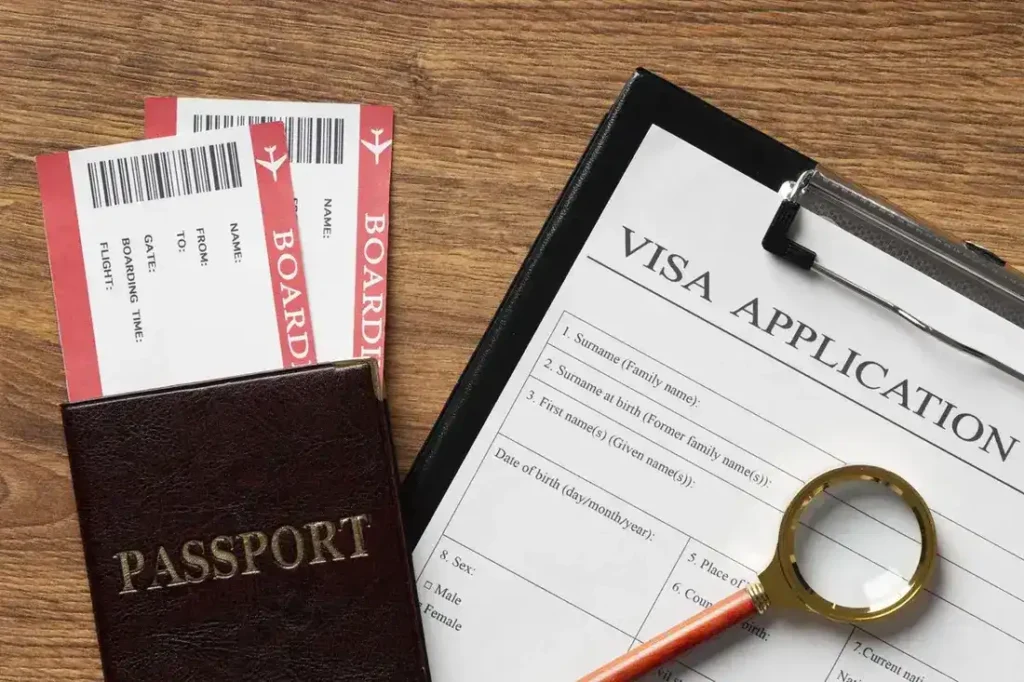 "Passport, boarding passes, and visa application form flat lay – Japan travel preparation concept."