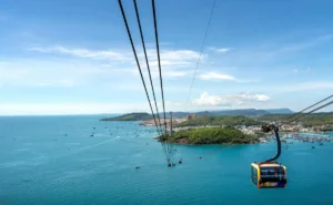 Scenic view of the Hon Thom Cable Car gliding over turquoise waters in Phu Quoc, Vietnam.