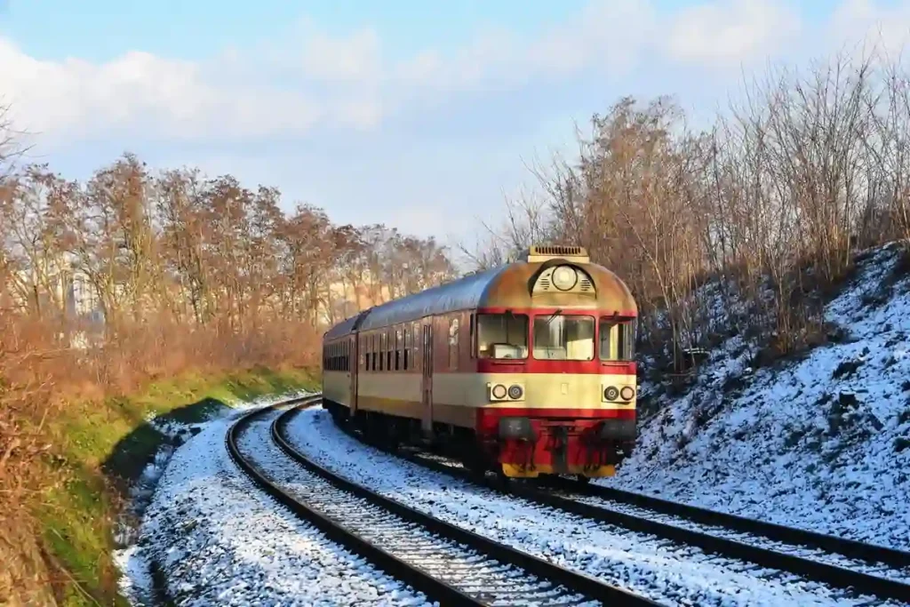 4.compressed_train_japan_under100 “Cheapest time to go to Japan – scenic off-season train travel through snowy countryside”