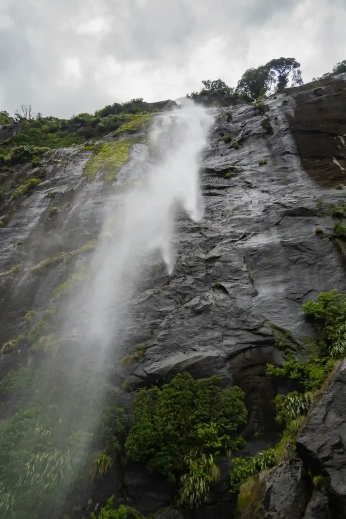 “Vasundhara Falls cascading down rocky cliffs near Mana Village on the way to Satopanth Tal – scenic waterfall near Badrinath”